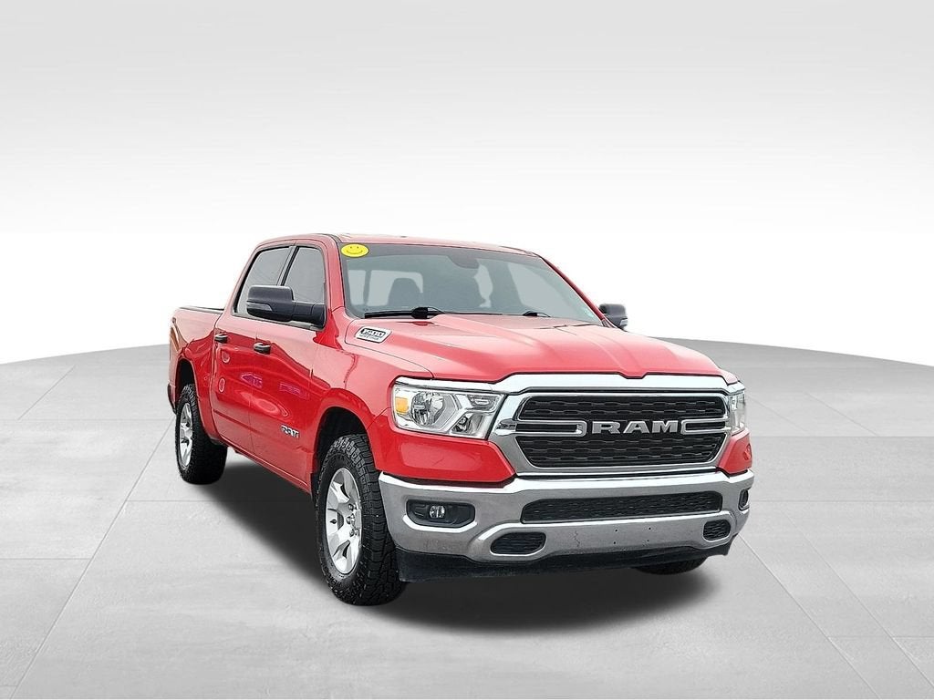 2023 RAM 1500 Big Horn in Red — front three-quarter view