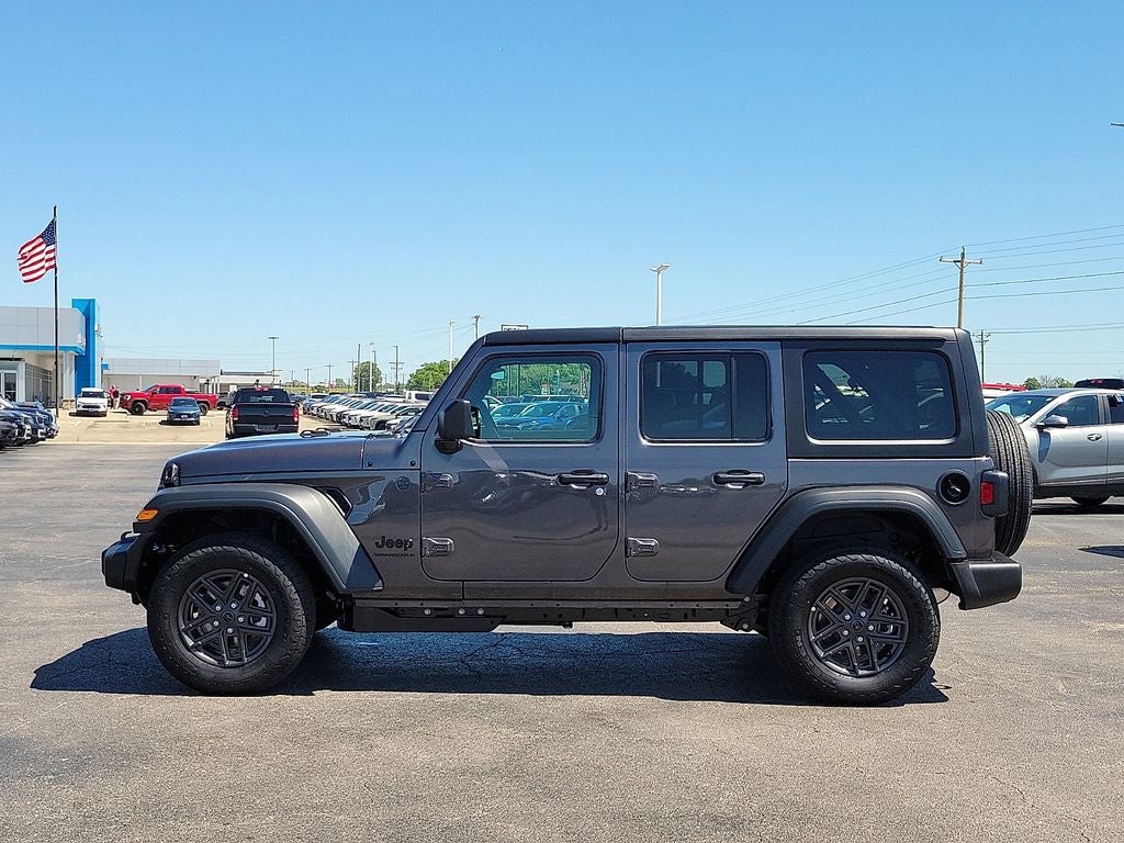 2026 Jeep Wrangler — rear three-quarter view