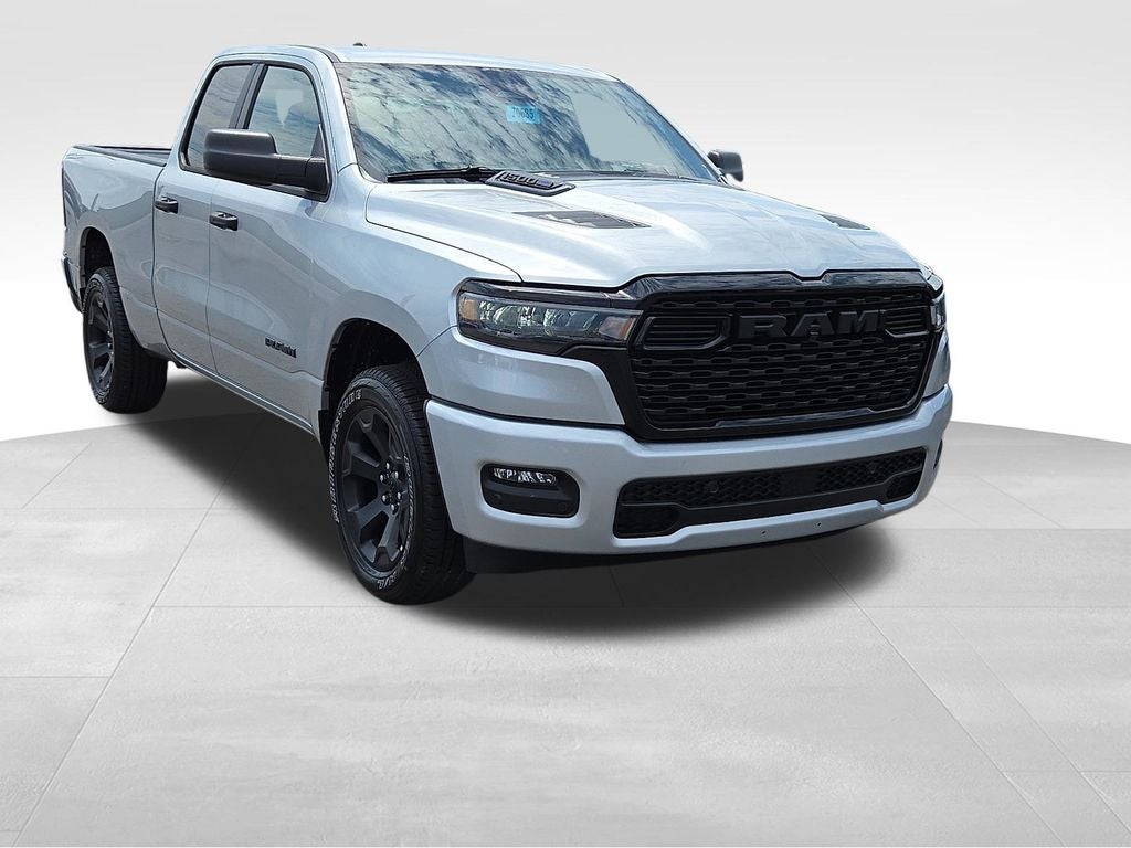 2026 RAM 1500 Express in Silver Zynith — front three-quarter view