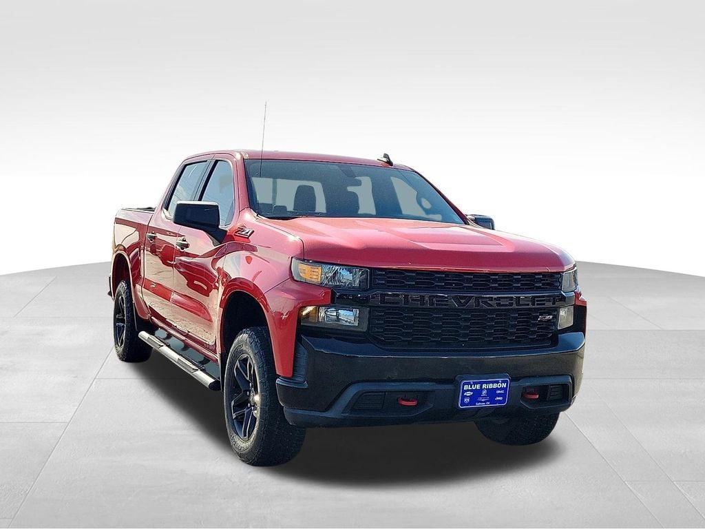 2020 Chevrolet Silverado 1500 Custom Trail Boss in Red Hot — front three-quarter view