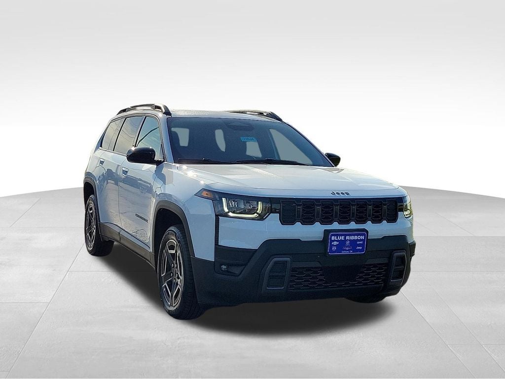 2026 Jeep Cherokee Laredo in Bright White Clearcoat — front three-quarter view