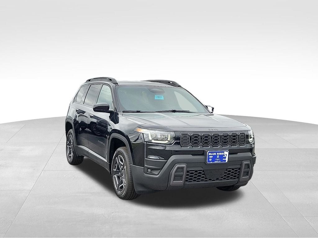 2026 Jeep Cherokee Laredo in Diamond Black Crystal Pearlcoat — front three-quarter view