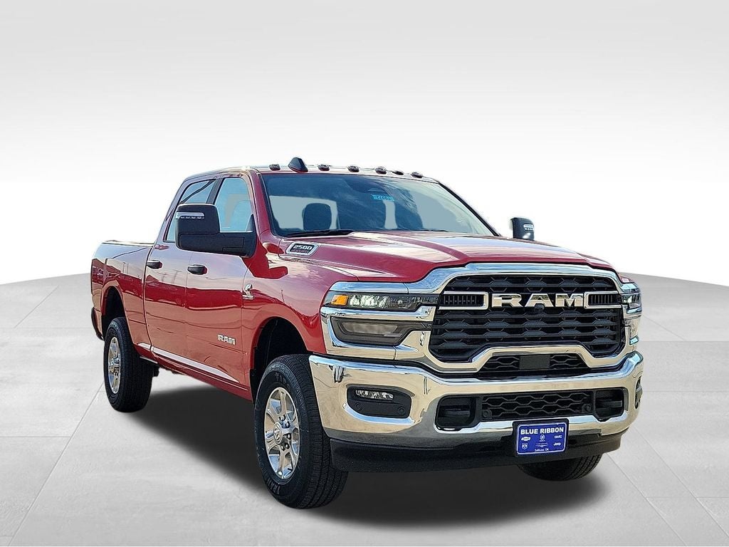 2026 RAM 2500 Big Horn in Flame Red Clearcoat — front three-quarter view