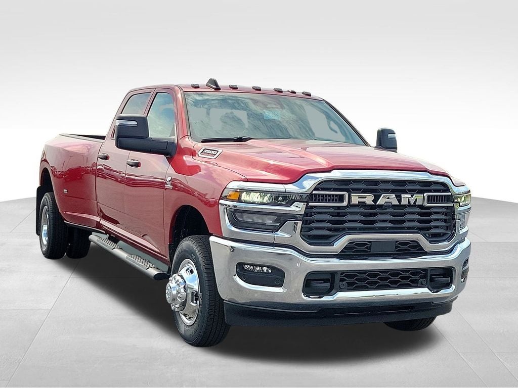 2026 RAM 3500 Tradesman in Molten Red Pearlcoat — front three-quarter view